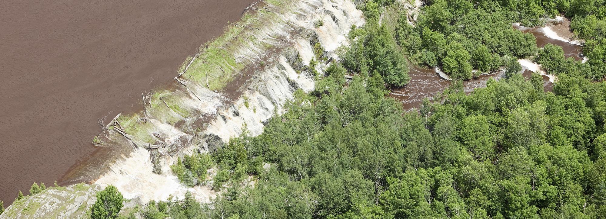 Aerial view of a dam breach